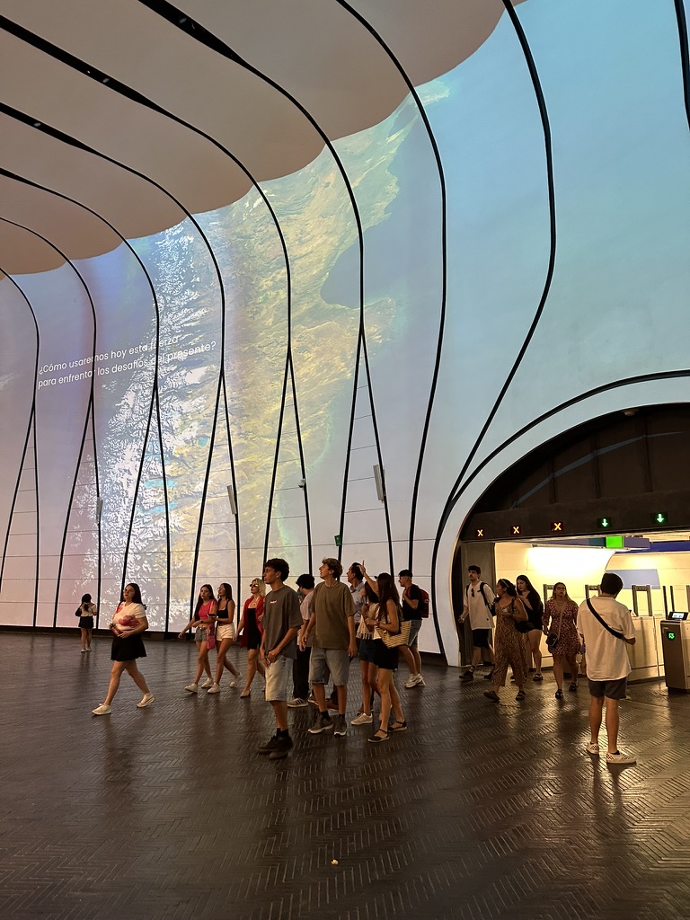 Visitors at an immersive projection at MUT