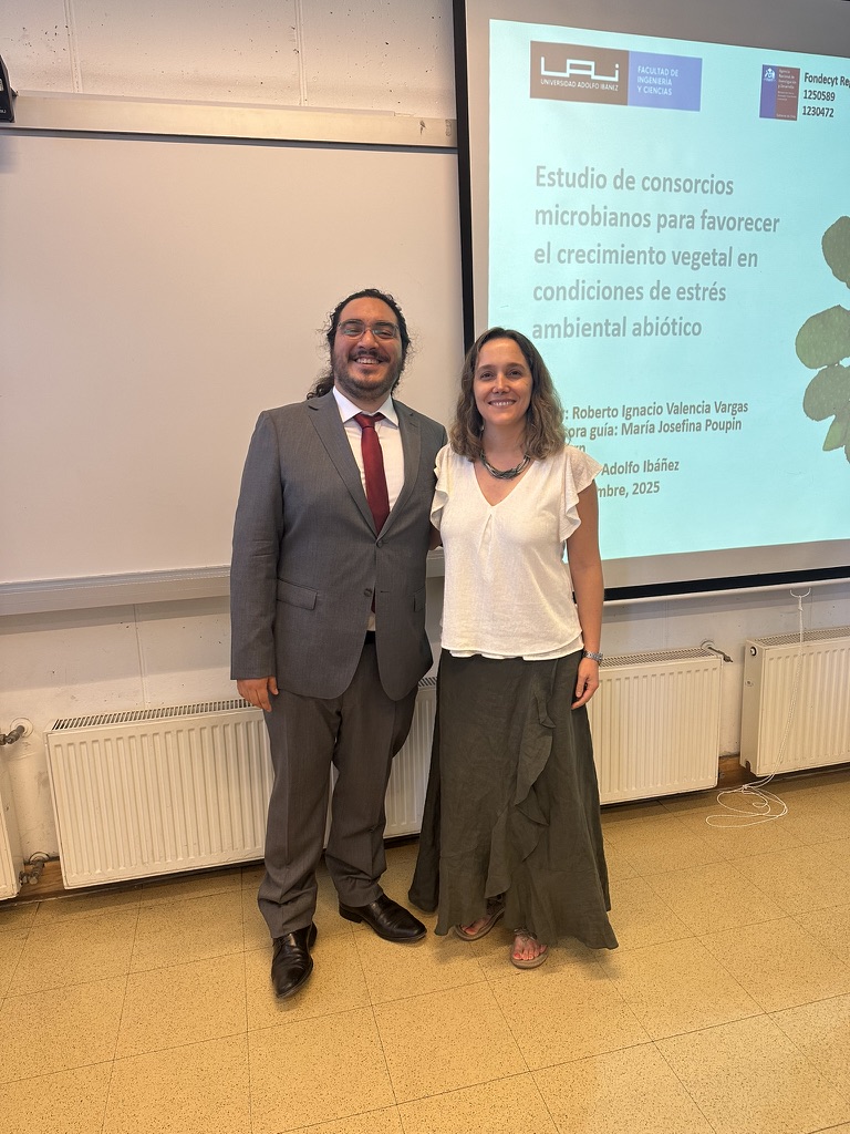 Roberto Valencia Vargas with María Josefina Poupin after his master's thesis defense